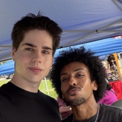 tommy and omar at their farmers market booth